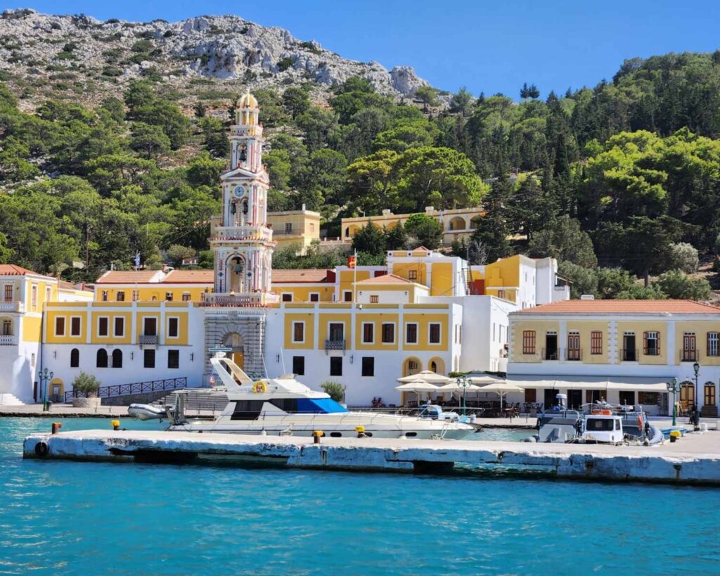 Discover why a family cruise to Symi from Rhodes is the perfect day trip—colorful towns, hidden beaches, and the stunning Panormitis Monastery.
